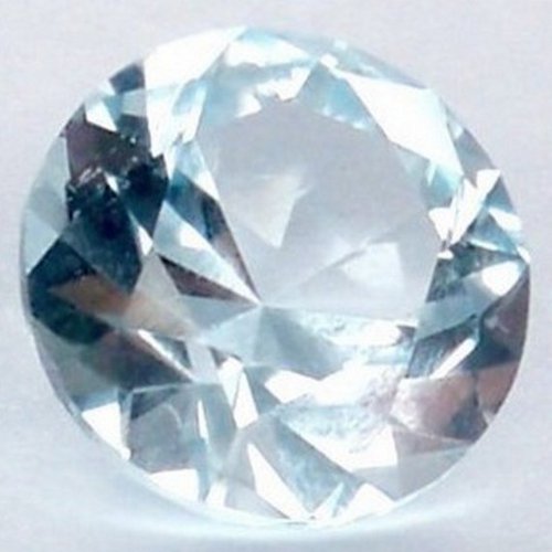 Faceted topaz cabochon