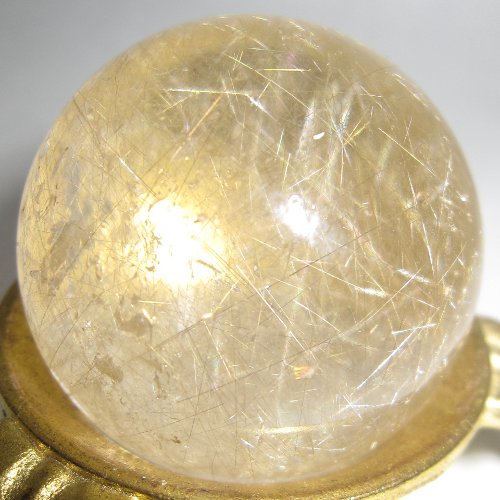 Rutilated quartz sphere