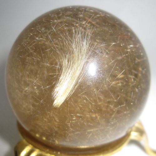 Rutilated quartz sphere
