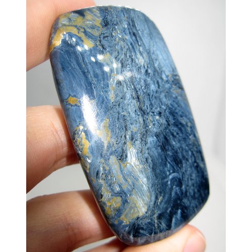 Rhodusite cabochon Rhodusite cabochon